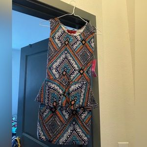 Brand new dress with peplum-nice abstract design